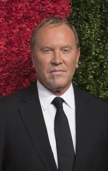 what nationality is michael kors|when was Michael Kors founded.